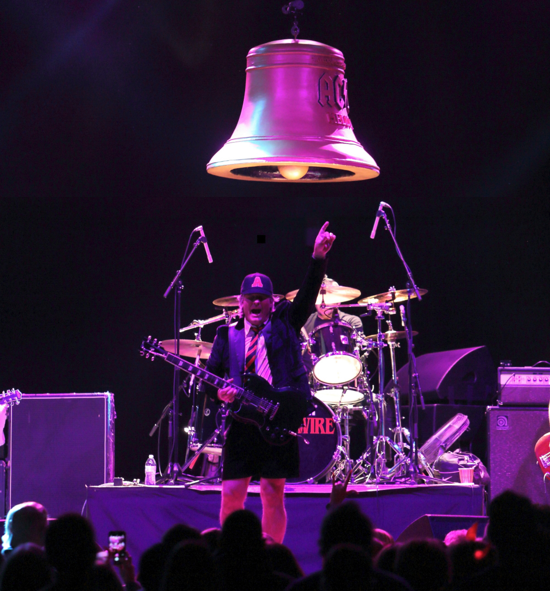 LIVE WIRE guitarist beneath the Hells Bell prop